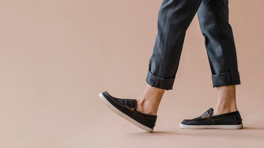 Flex Shoe Store -Flex Shoe Store Man in a jeans and slip